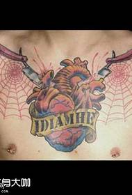 chest heart spider web tattoo pattern