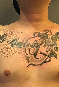 Tetovací vzor s pánskými hrudními rekvizitami a angličtinou