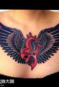 chest heart wing tattoo pattern