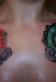 chest two different colored eye tattoo patterns
