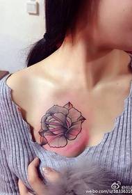 girls chest flower tattoo looks so sexy