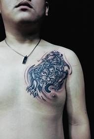 Just a little bit of chest small unicorn tattoo