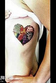 chest red heart tattoo pattern