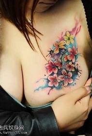 Chest color flower tattoo pattern