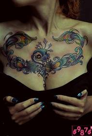 girl chest domineering feather tattoo picture