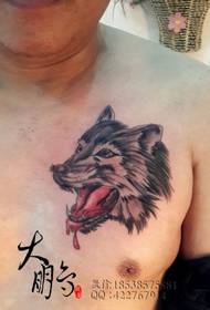 dripping wolf head chest tattoo