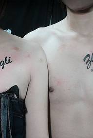 English tattoo under the couple's clavicle