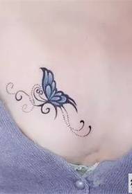 female chest personality tattoo