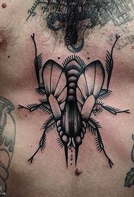 рисунок татуировки моли на груди