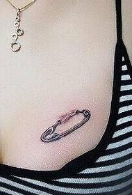 girls chest fresh small needle tattoo