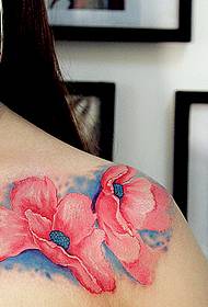 female chest pink flower tattoo