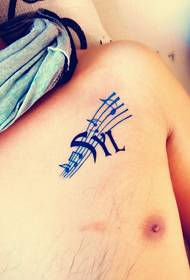 chest note pattern tattoo work picture