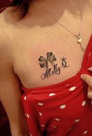 female chest bow letter Tattoo