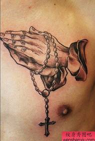 chest prayer hand cross tattoo work