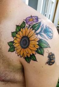 Sunflower tattoo picture male shoulder sunflower tattoo picture 58070-Tattoo cartoon boy shoulder cartoon tattoo picture
