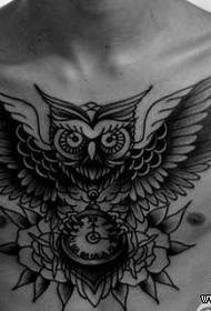 a cool owl tattoo pattern on the chest