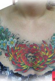 Female chest is cool classic chrysanthemum and skull tattoo pattern