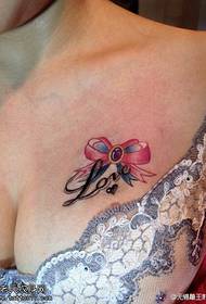 female chest Color bow letter tattoo pattern