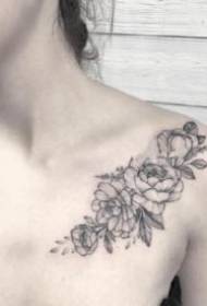 kızın omuz siyah-gri çiçek dövme sanat