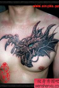 a fierce chest faucet tattoo picture