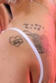 lady gaga tattoo star shoulder small daisies and heart tattoo pictures