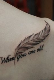 girl shoulder feather with letter tattoo pattern