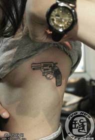Women's chest pistol tattoo works by tattoo figure Let's share