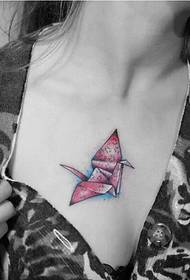female chest beautiful looking colorful paper crane tattoo picture