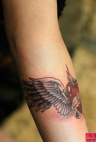 an arm love wings tattoo pattern