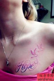 girls chest color letters with bird tattoo pattern