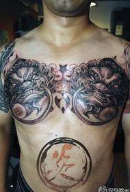 man's chest is very cool animal face ring head tattoo pattern