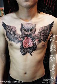 Man's chest is very handsome and cool owl tattoo pattern