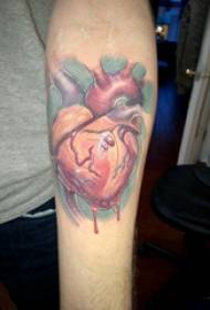 Arm tattoo material, fresh heart tattoo picture on boy's arm