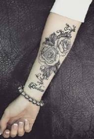 Appreciate the black-gray tattoo pattern on the small arm