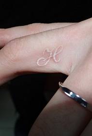 Small finger invisible tattoo