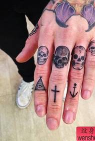 Finger creative skull tattoo work