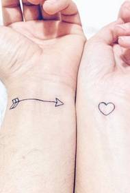 Simple matching tattoo pattern on couple finger joints