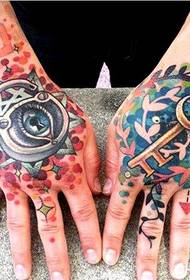 Unique western color tattoo on the back of the hand