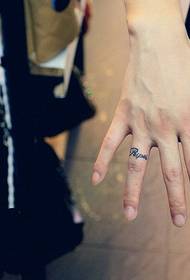 Finger fashion english ring tattoo