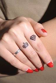 Finger small diamond crown tattoo picture