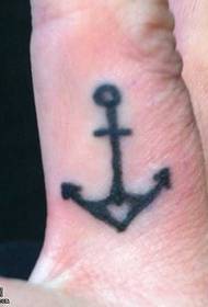 Simple anchor tattoo pattern on finger