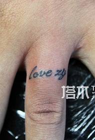 Beauty finger letter tattoo