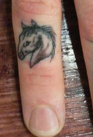 Small fresh horse head tattoo on finger