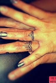 Finger couple ring tattoo work