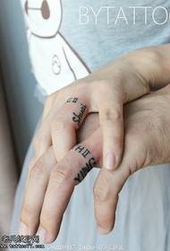 Engelsk tatoveringsring på parfinger