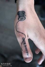 Padrão de tatuagem no dedo