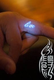Finger features fluorescent letter tattoo appreciation picture