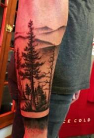Tattoo picture of tall dog pine on arm