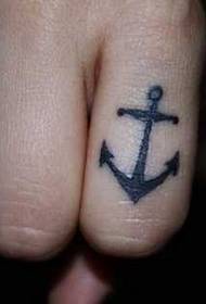 Little anchor tattoo pattern on finger