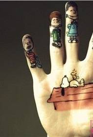 Man finger cute cartoon character tattoo